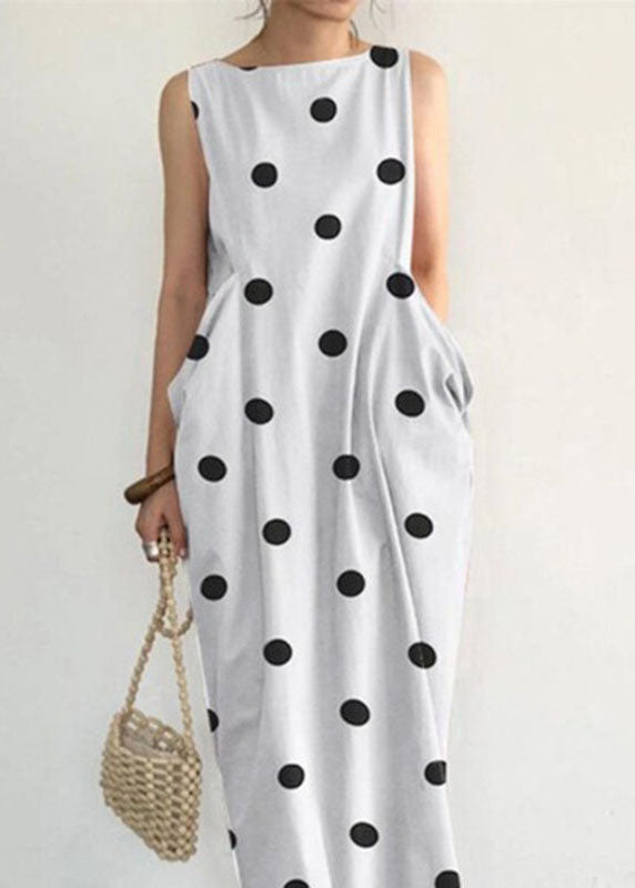 Robe longue noire sans manches à pois et poches