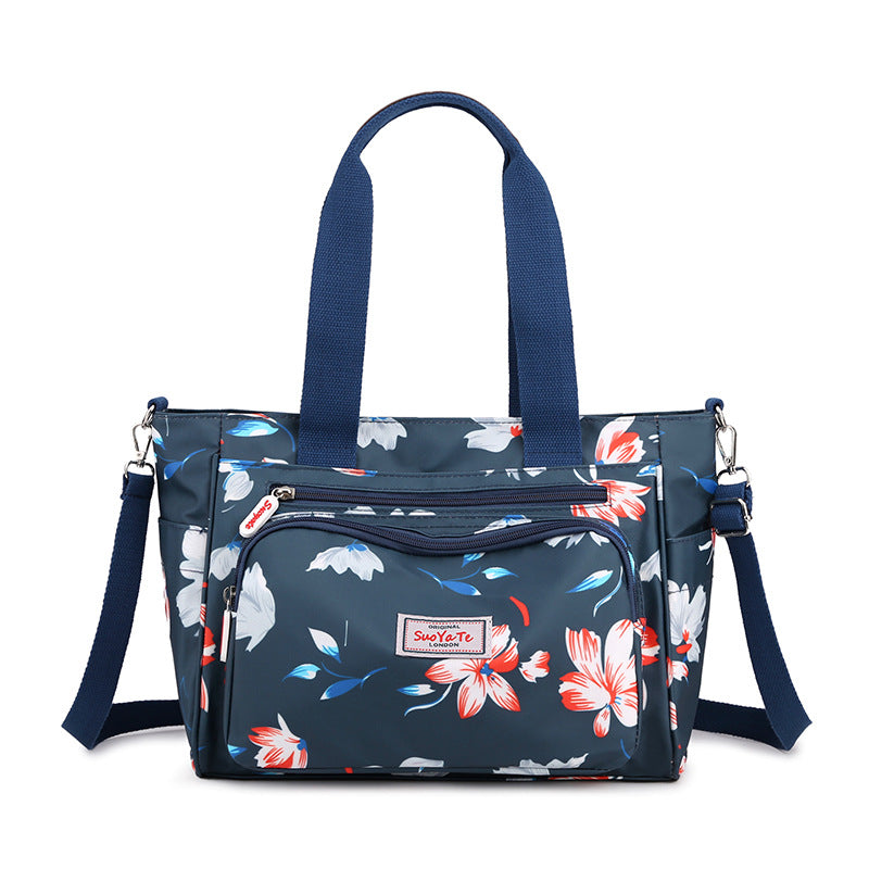 Gluschwein - Wasserdichte Tasche mit Blumenmuster und großem Fassungsvermögen Blaue Magnolie