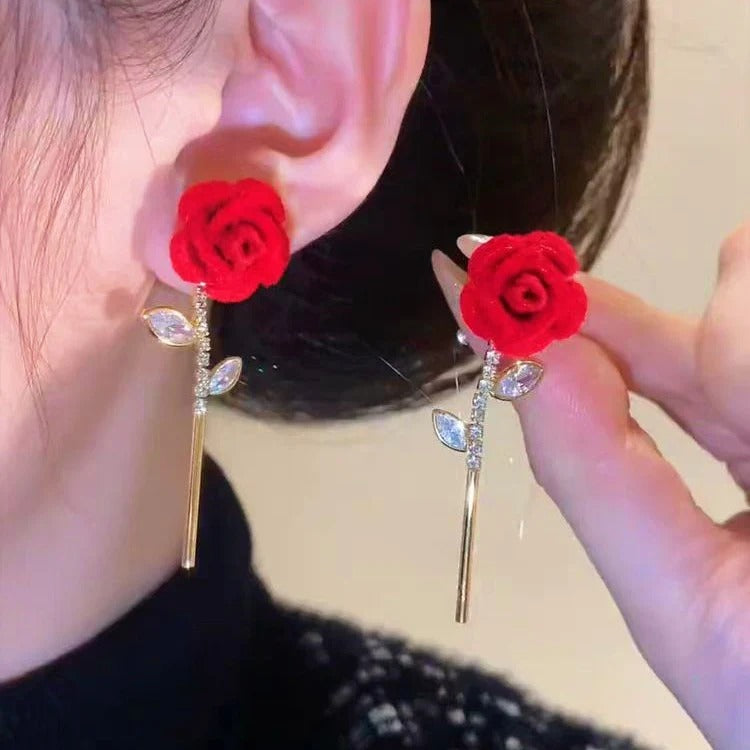Boucles d'oreilles roses en velours rouge
