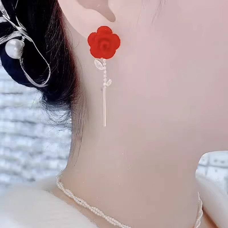 Boucles d'oreilles roses en velours rouge
