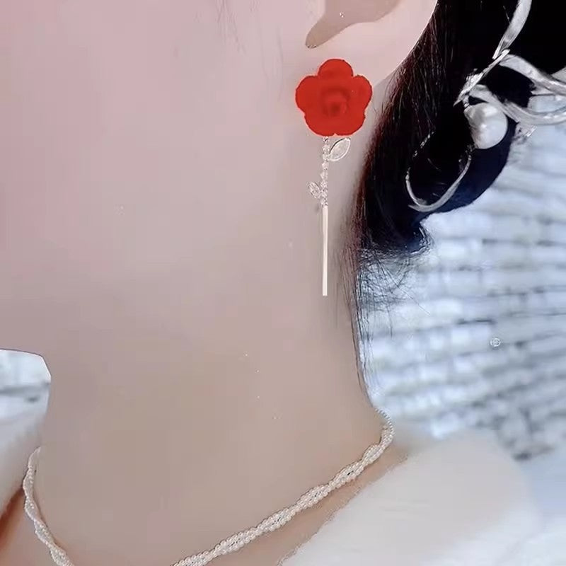 Boucles d'oreilles roses en velours rouge