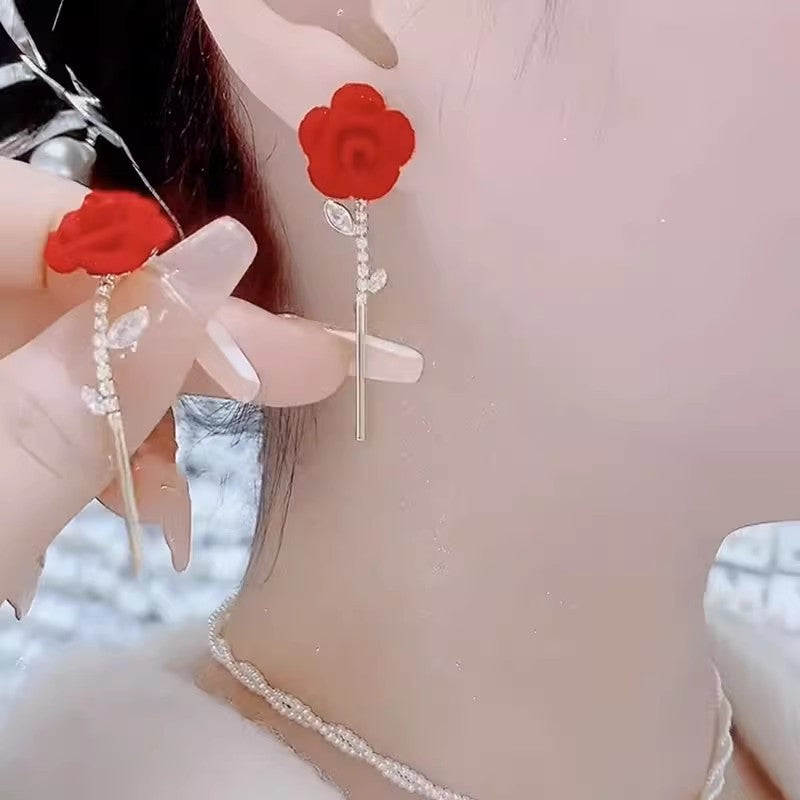Boucles d'oreilles roses en velours rouge