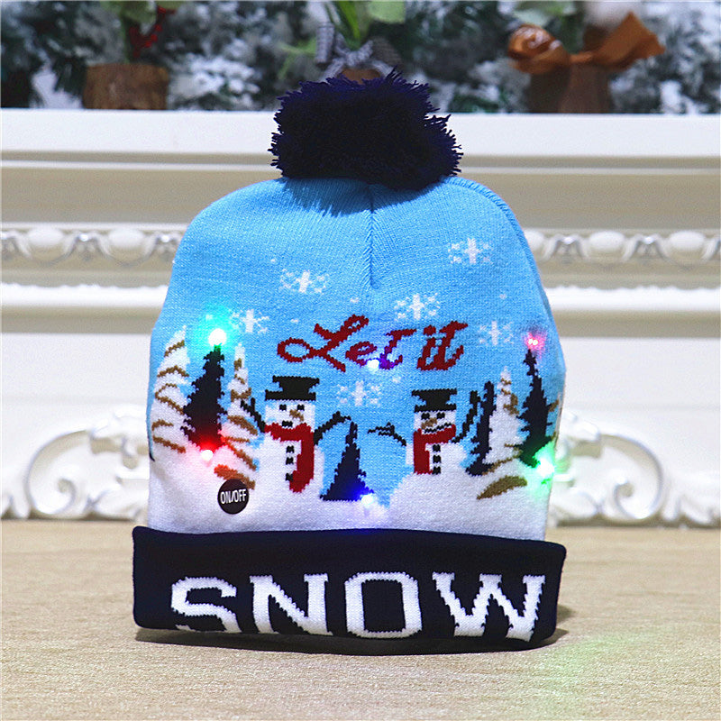 Gluschwein - Bunte leuchtende gestrickte Weihnachtsmütze HIMMELBLAUER SCHNEEMANN
