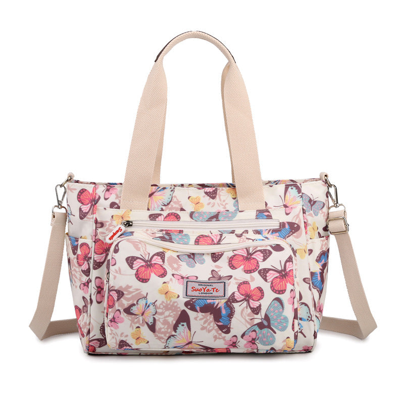 Gluschwein - Wasserdichte Tasche mit Blumenmuster und großem Fassungsvermögen Regenbogen-Schmetterling