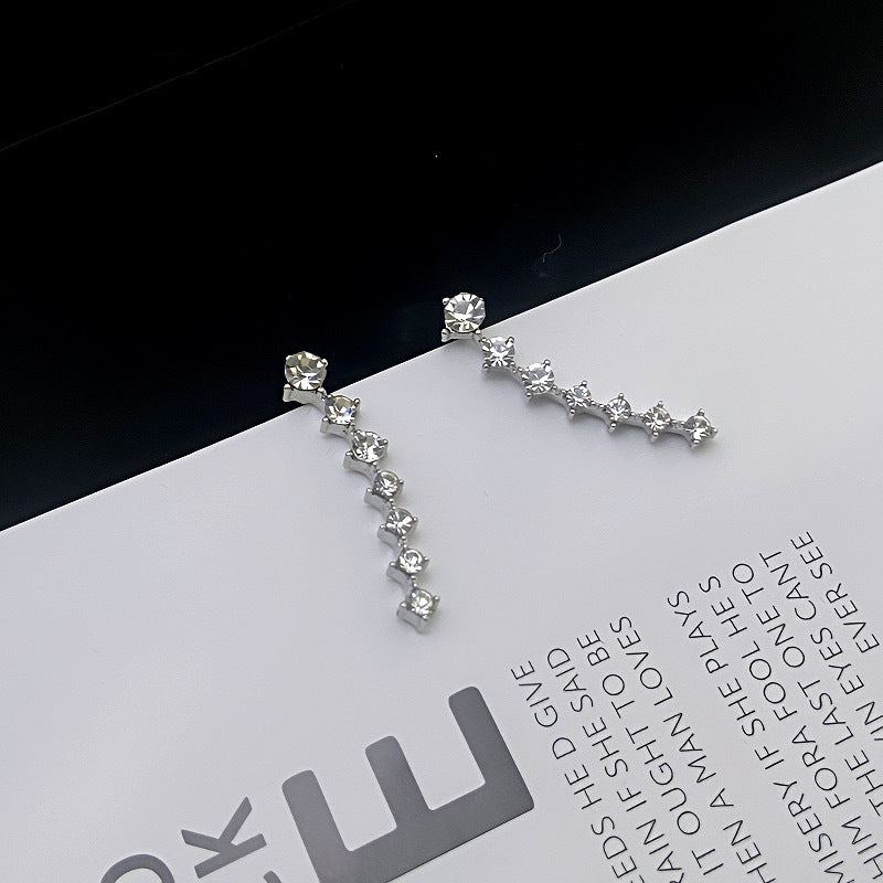 Gluschwein - Ohrstecker mit sieben Sternen und Diamanten