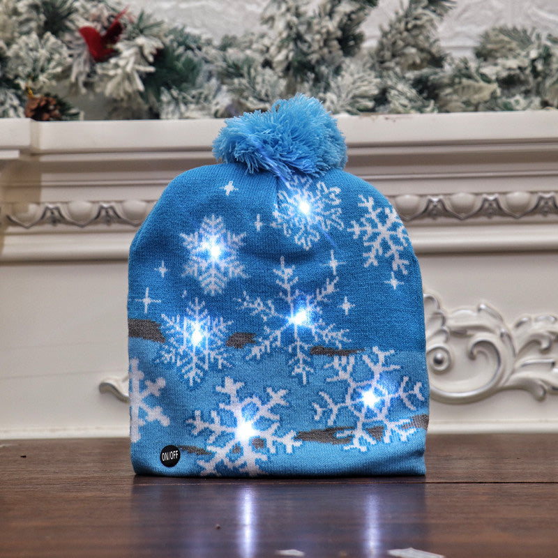 Gluschwein - Bunte leuchtende gestrickte Weihnachtsmütze SCHNEEFLOCKE