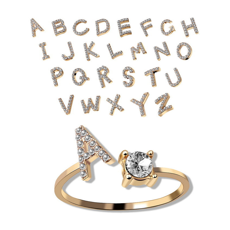 Gluschwein - Buchstaben Ring aus Kristall golden
