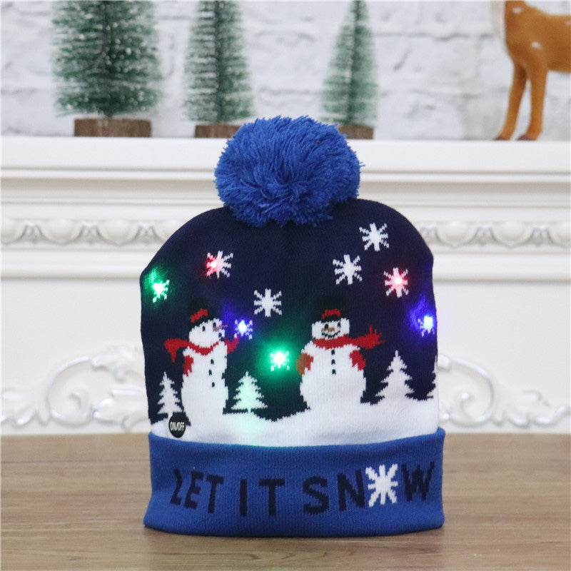 Gluschwein - Bunte leuchtende gestrickte Weihnachtsmütze TIEFBLAUER SCHNEEMANN
