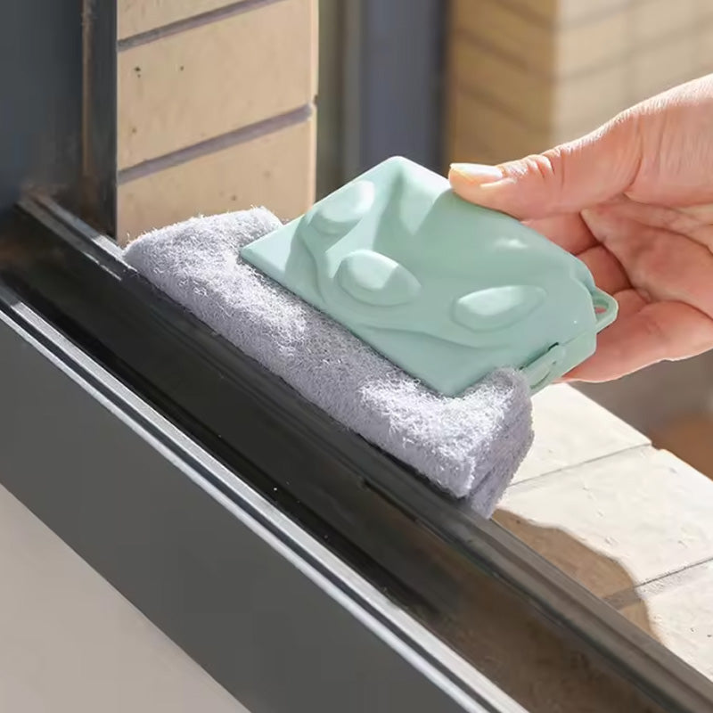 Brosse magique pour nettoyer les vitres