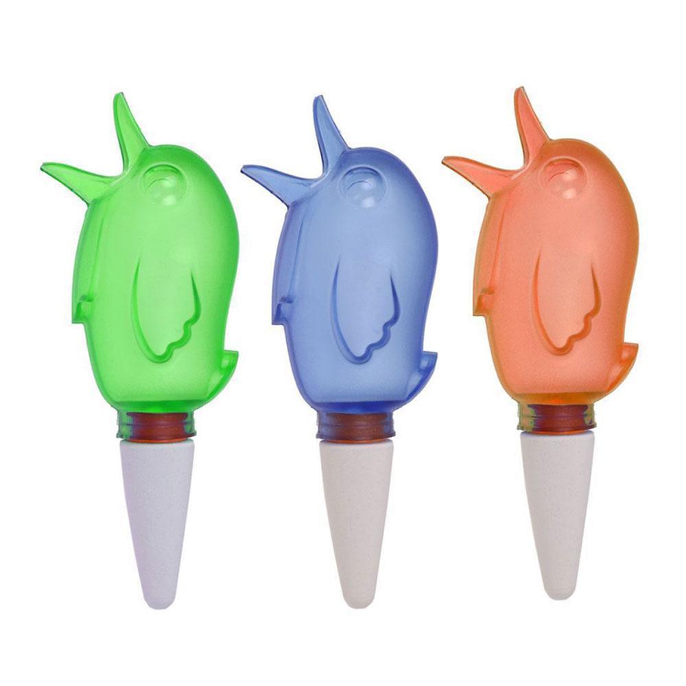 Gluschwein - Automatische Vogel-förmige Gießkanne Grün und Blau und Orange