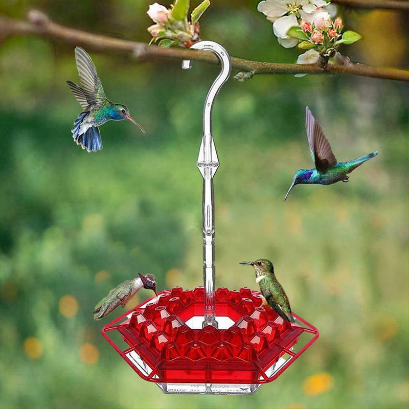 Gluschwein - Hängende rote sechseckige Kolibri-Fütterungsanlage