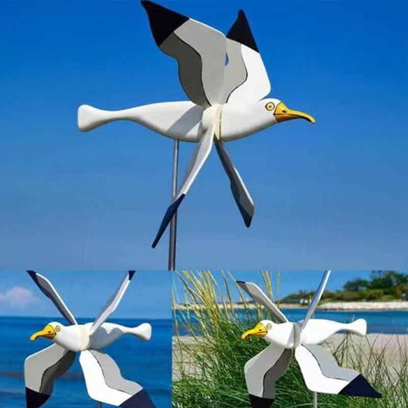 Gluschwein - Windmühle mit Möwe als Gartendekoration