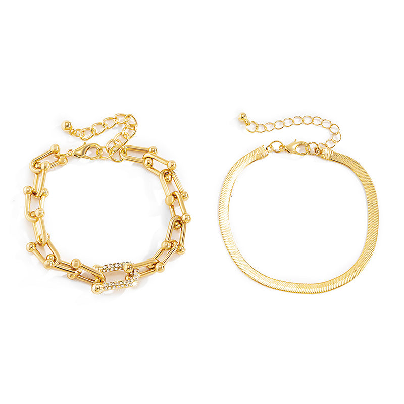 Gluschwein - Minimalistisches Schlangenknochen-Metallarmband Golden