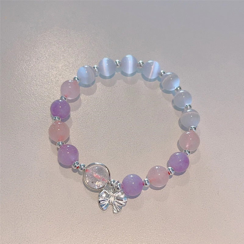 Gluschwein - Imitation Katzenauge Kristall Schmetterling Armband Lila Fliege