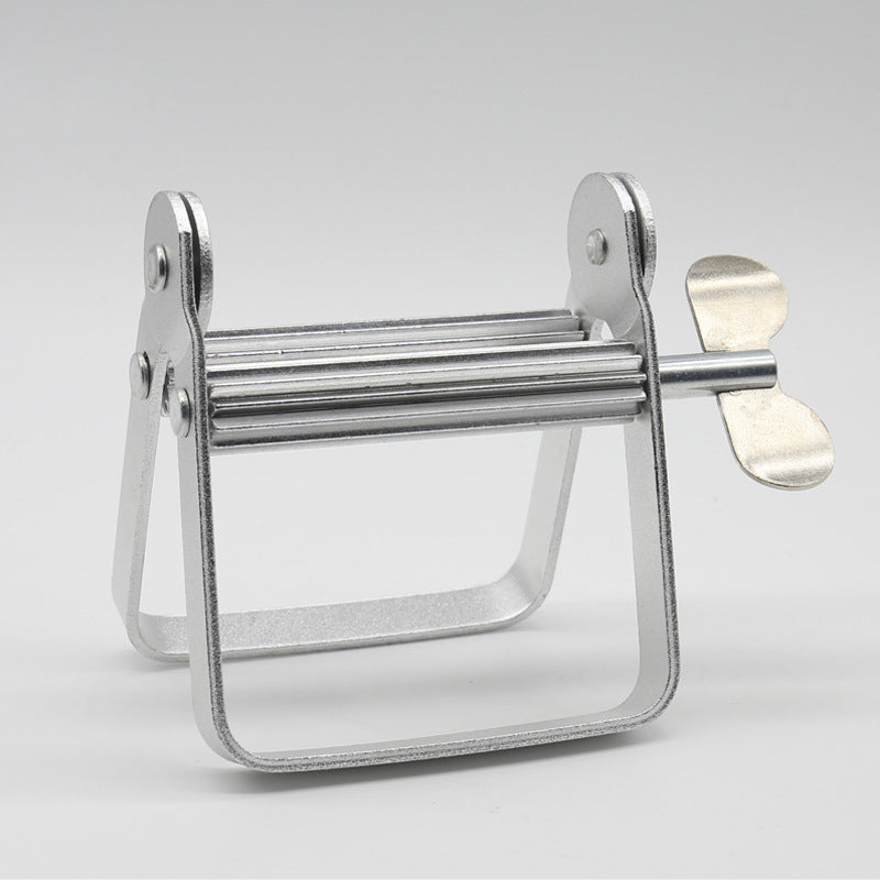 Gluschwein - Toothpaste Squeeze Roller Silver