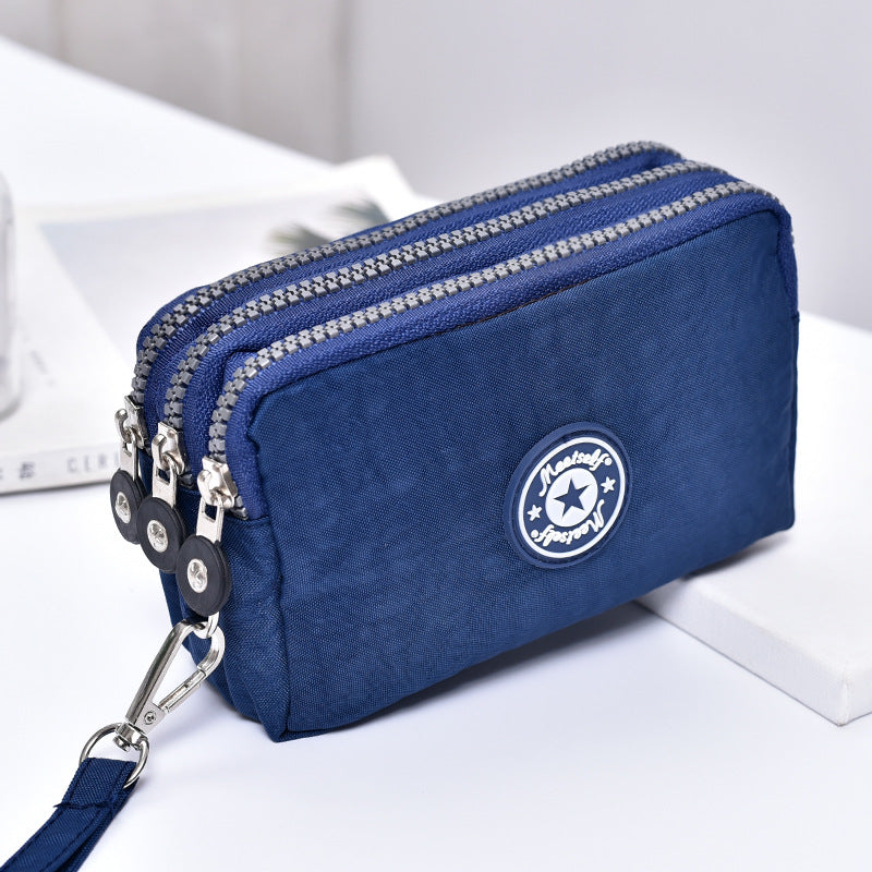 Gluschwein - Lässige wasserdichte Clutch mit Handschlaufe Navy blau