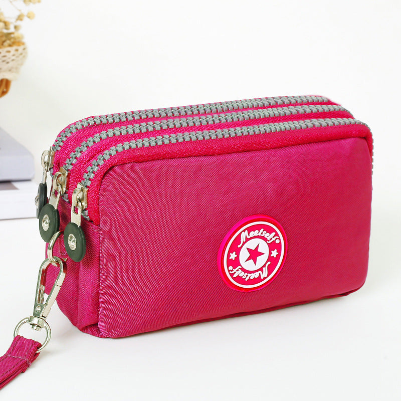 Gluschwein - Lässige wasserdichte Clutch mit Handschlaufe Fuchsie