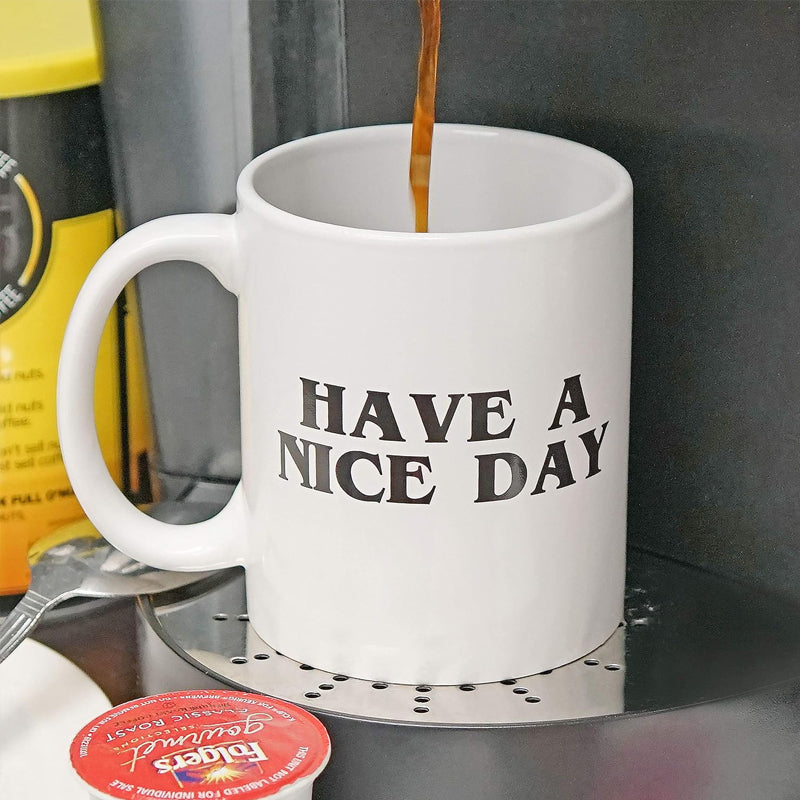 Gluschwein - Lustige Mittelfinger-Tasse „Have a Nice Day“