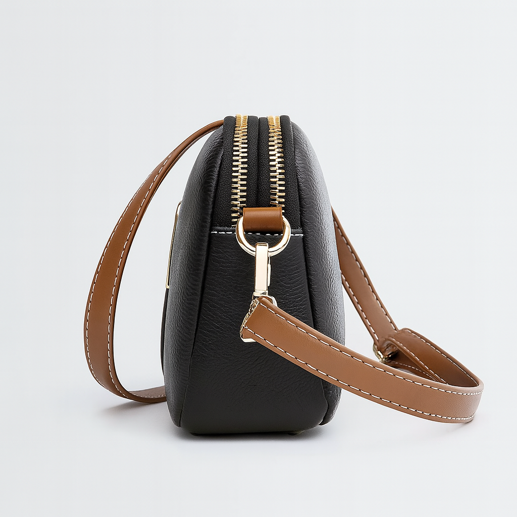 Catriona | Minimalistische Umhängetasche in Muschelform