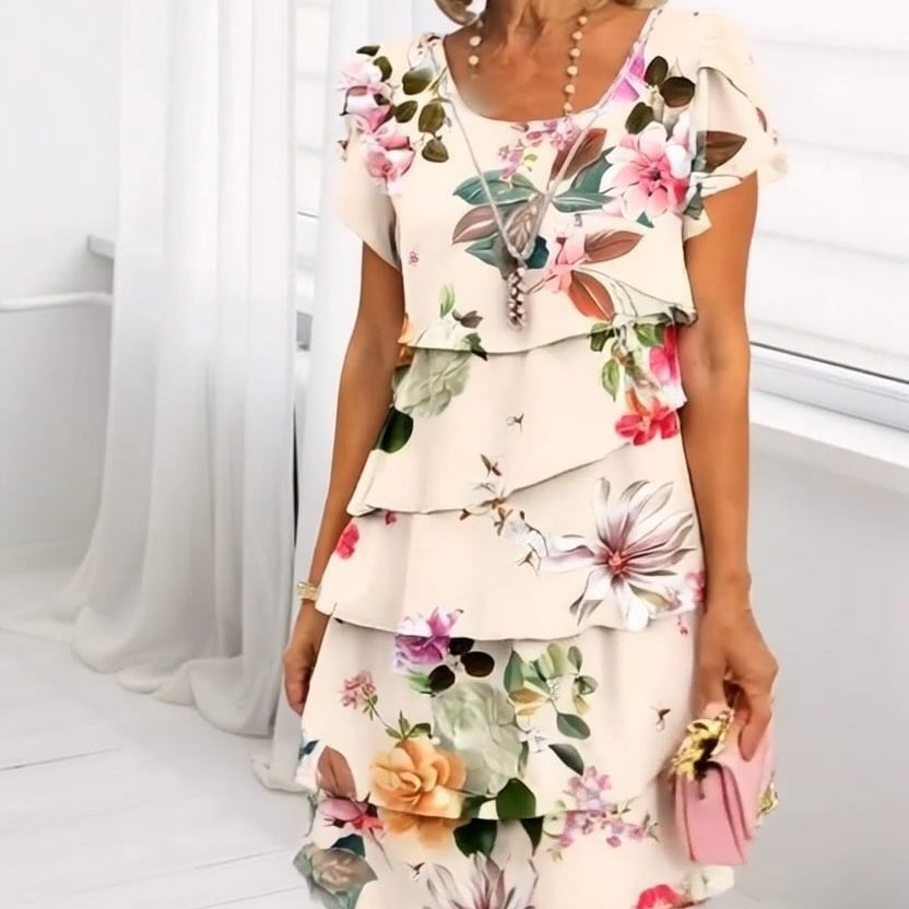 Gluschwein - Kaskadenkleid mit Blumenmuster und mehreren Pflanzen