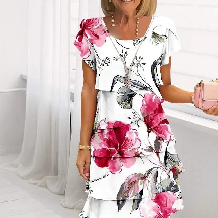 Gluschwein - Kaskadenkleid mit Blumenmuster und mehreren Pflanzen