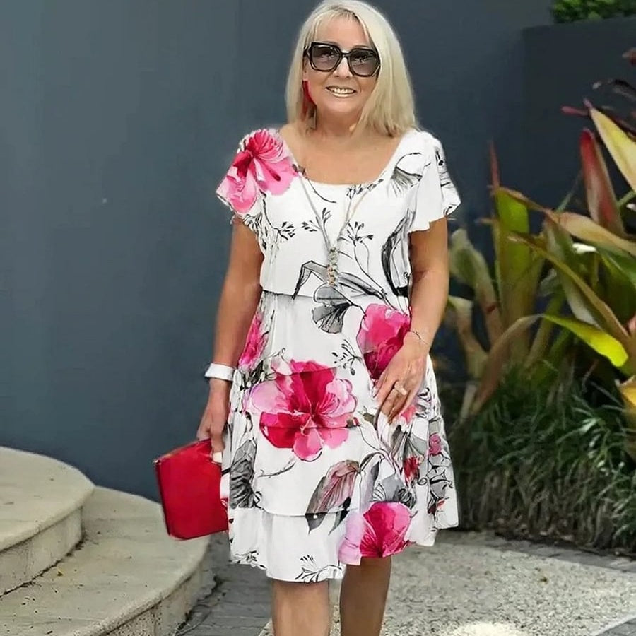 Gluschwein - Kaskadenkleid mit Blumenmuster und mehreren Pflanzen