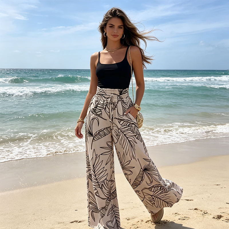 Damenhose mit elastischem Bund, hohem Bund, Blätterprint und weitem Bein